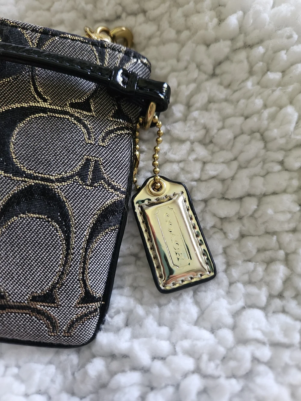 Coach Poppy Wristlet in Black and Gold Hardware